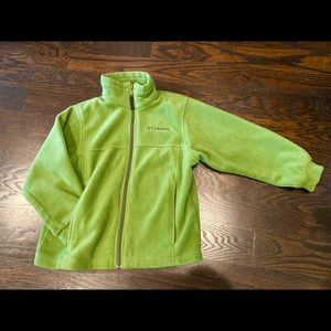 Kid’s Size 8 Columbia fleece jacket w zipper pockets & adjustable fit sizing.